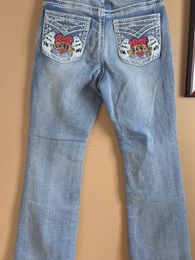 Women’s Light Blue Embroidered Heart Wing Jeans